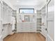 Large walk-in closet with ample shelving and drawers at 1516 S Orange Ave, Sarasota, FL 34239