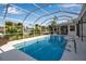 Inviting screened pool area, perfect for relaxation at 1649 Stanford Ln, Sarasota, FL 34231