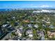Aerial view of home and surrounding neighborhood near the water at 1827 Morris St, Sarasota, FL 34239