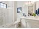 Clean bathroom with a walk-in shower and modern fixtures at 1827 Morris St, Sarasota, FL 34239