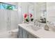 Stylish bathroom with a walk-in shower and modern vanity at 1827 Morris St, Sarasota, FL 34239