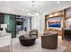Gathering room with comfortable seating, a large TV, and access to a patio at 1827 Morris St, Sarasota, FL 34239