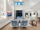 Spacious living room with a stone fireplace, built-in shelving, and comfortable seating at 1827 Morris St, Sarasota, FL 34239