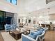 Open living space with light hardwood floors and comfortable seating at 1827 Morris St, Sarasota, FL 34239