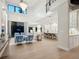 Bright and airy living room with high ceilings, hardwood floors, and open floor plan at 1827 Morris St, Sarasota, FL 34239