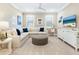 Cozy media room features a sectional sofa and large TV at 1827 Morris St, Sarasota, FL 34239