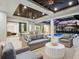 Covered patio overlooking a refreshing pool, perfect for entertaining at 1827 Morris St, Sarasota, FL 34239