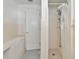 Clean bathroom with shower stall and built-in storage at 202 23Rd W St, Bradenton, FL 34205