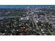Aerial view of a home encircled in red with a city and water in the background at 217 S Shade Ave, Sarasota, FL 34237