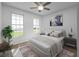 Comfortable bedroom with soft lighting, large windows, and tasteful decor, a tranquil space for relaxation at 217 S Shade Ave, Sarasota, FL 34237