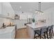 Modern kitchen with island seating and stainless steel appliances at 2248 Novus St, Sarasota, FL 34237