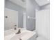 Clean bathroom with white vanity and shower at 294 Hidden Bay Dr # 203, Osprey, FL 34229