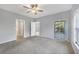 Primary bedroom with access to bathroom and balcony at 294 Hidden Bay Dr # 203, Osprey, FL 34229