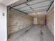 Attached garage with concrete floor and ample space at 294 Hidden Bay Dr # 203, Osprey, FL 34229