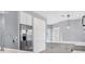 Kitchen boasts stainless steel appliances and white cabinetry at 294 Hidden Bay Dr # 203, Osprey, FL 34229