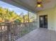 Relaxing screened porch overlooking lush tropical landscape at 294 Hidden Bay Dr # 203, Osprey, FL 34229