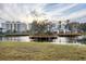 Peaceful waterfront view with fountain feature at 294 Hidden Bay Dr # 203, Osprey, FL 34229