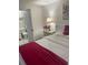 Cozy bedroom with ensuite bathroom and soft color scheme at 3218 Ramblewood N Dr # 19C2, Sarasota, FL 34237