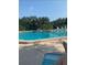 Relaxing community pool area at 3218 Ramblewood N Dr # 19C2, Sarasota, FL 34237