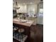 Modern kitchen with wood countertops and stainless steel appliances at 3218 Ramblewood N Dr # 19C2, Sarasota, FL 34237