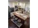 Modern kitchen with wood countertops and stainless steel appliances at 3218 Ramblewood N Dr # 19C2, Sarasota, FL 34237
