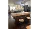 Modern kitchen with wood countertops and stainless steel appliances at 3218 Ramblewood N Dr # 19C2, Sarasota, FL 34237