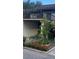 Townhouse with balcony and landscaping at 3218 Ramblewood N Dr # 19C2, Sarasota, FL 34237