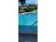 Community swimming pool with clear water at 3218 Ramblewood N Dr # 19C2, Sarasota, FL 34237