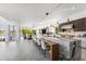 Modern kitchen with a large island and marble countertops at 3631 San Remo Ter, Sarasota, FL 34239