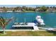 Private boat dock with jet skis and boat at 3631 San Remo Ter, Sarasota, FL 34239
