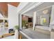 Bedroom with sliding doors to lanai and pool views at 3631 San Remo Ter, Sarasota, FL 34239