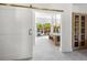 Spa-like bathroom with barn door and walk-in shower at 3631 San Remo Ter, Sarasota, FL 34239