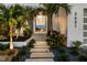 Inviting entryway with a walkway leading to a modern front door at 3631 San Remo Ter, Sarasota, FL 34239