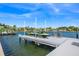 Covered boat dock with two jet skis at 3631 San Remo Ter, Sarasota, FL 34239