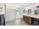 Modern bathroom with floating vanity, walk-in shower and large mirror at 3631 San Remo Ter, Sarasota, FL 34239