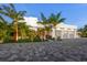 Stunning modern home with a large driveway and lush landscaping at 3631 San Remo Ter, Sarasota, FL 34239