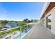 Rooftop deck with pool and water views at 3631 San Remo Ter, Sarasota, FL 34239