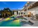 Expansive pool and patio at night, gorgeous views at 3631 San Remo Ter, Sarasota, FL 34239