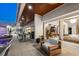 Night view of outdoor entertainment area with pool at 3631 San Remo Ter, Sarasota, FL 34239