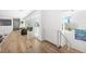 Light-filled hallway with hardwood floors and modern design at 3631 San Remo Ter, Sarasota, FL 34239