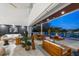 Open living space with sliding doors opening to patio and pool at 3631 San Remo Ter, Sarasota, FL 34239