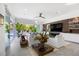 Living room with water views and a large TV at 3631 San Remo Ter, Sarasota, FL 34239