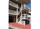 Building exterior with stairs and balconies at 3751 S School Ave # 29, Sarasota, FL 34239
