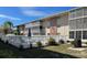 Community pool with surrounding fence and patio furniture at 3751 S School Ave # 29, Sarasota, FL 34239