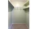 Large walk-in closet with double hanging rods at 3751 S School Ave # 29, Sarasota, FL 34239