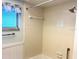 Bathroom with shower/tub combo and tile surround at 3751 S School Ave # 29, Sarasota, FL 34239