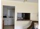 Small kitchen with pass-through to living area at 3751 S School Ave # 29, Sarasota, FL 34239