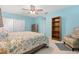 Bedroom with king bed, armchair, and built-in shelving at 3901 Oakhurst Blvd # 3001, Sarasota, FL 34233