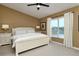 Spacious bedroom with a king-size bed and large window at 5370 Hyland Hills Ave # 2721, Sarasota, FL 34241