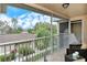 Spacious screened balcony overlooks community and provides scenic views at 5370 Hyland Hills Ave # 2721, Sarasota, FL 34241